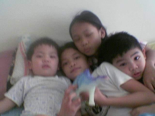Master Judith with her children in a family photograph from 2005